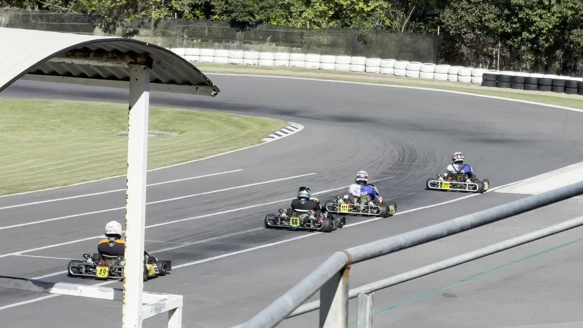 BR Motorsport #49 chasing the Force Phantom, ShapeCUT and CASA lead train through the esses on the opening laps at Cooloola